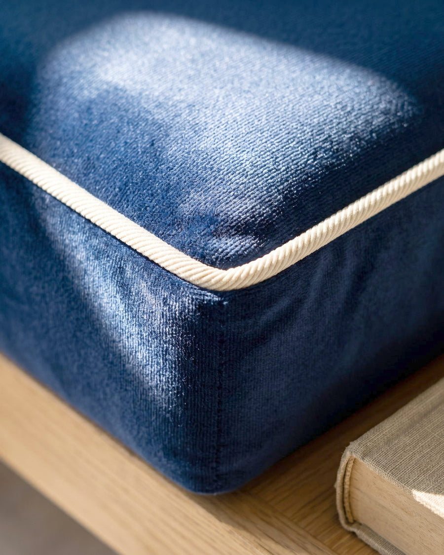 Close-up of the full, rounded edge of a seat cushion