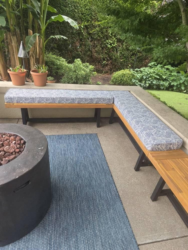 Customer photo: patterned outdoor cushions on an L-shaped patio bench