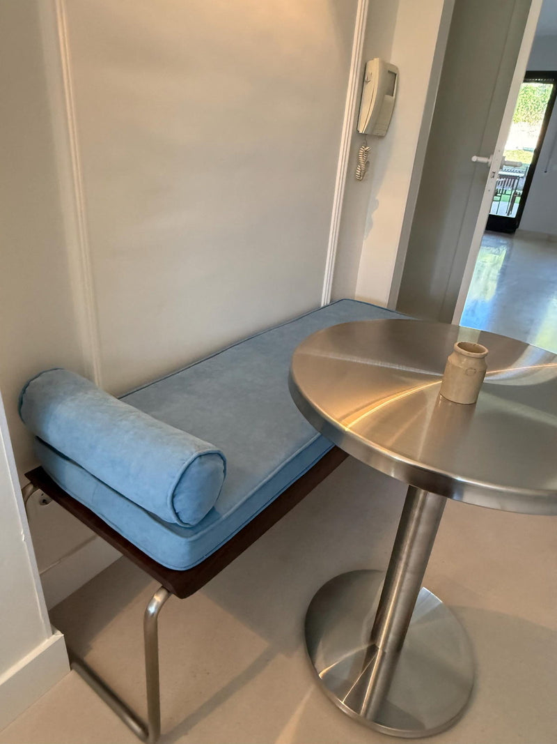 Customer photo: light-blue linen cushion and matching bolster on a kitchen bench