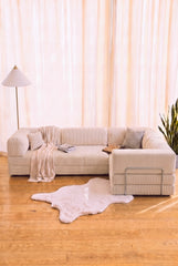 Poufudic Ecksofa in L-Form, Cremeweiß / Knochenweiß